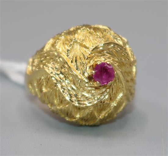 A gold and ruby ring